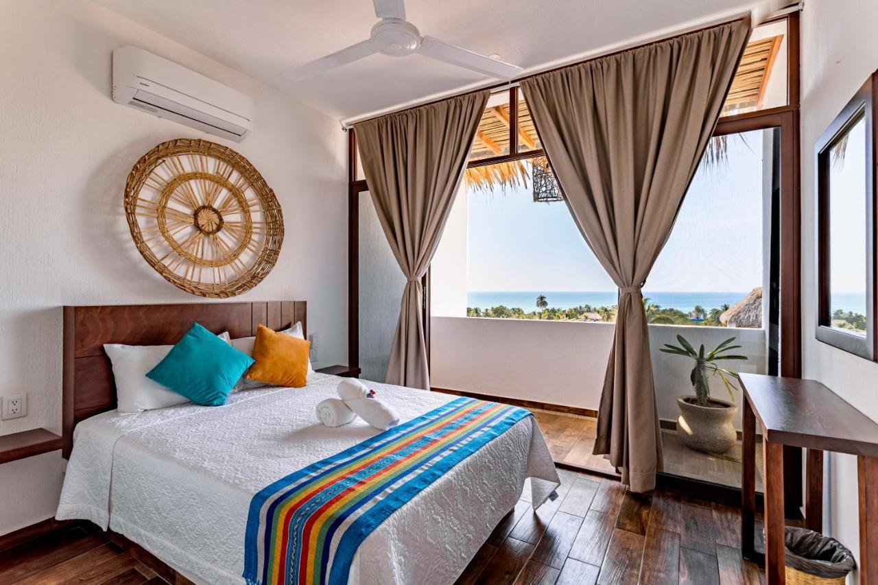 Punta Kai Hotel & Hostal 埃斯孔迪多港 外观 照片