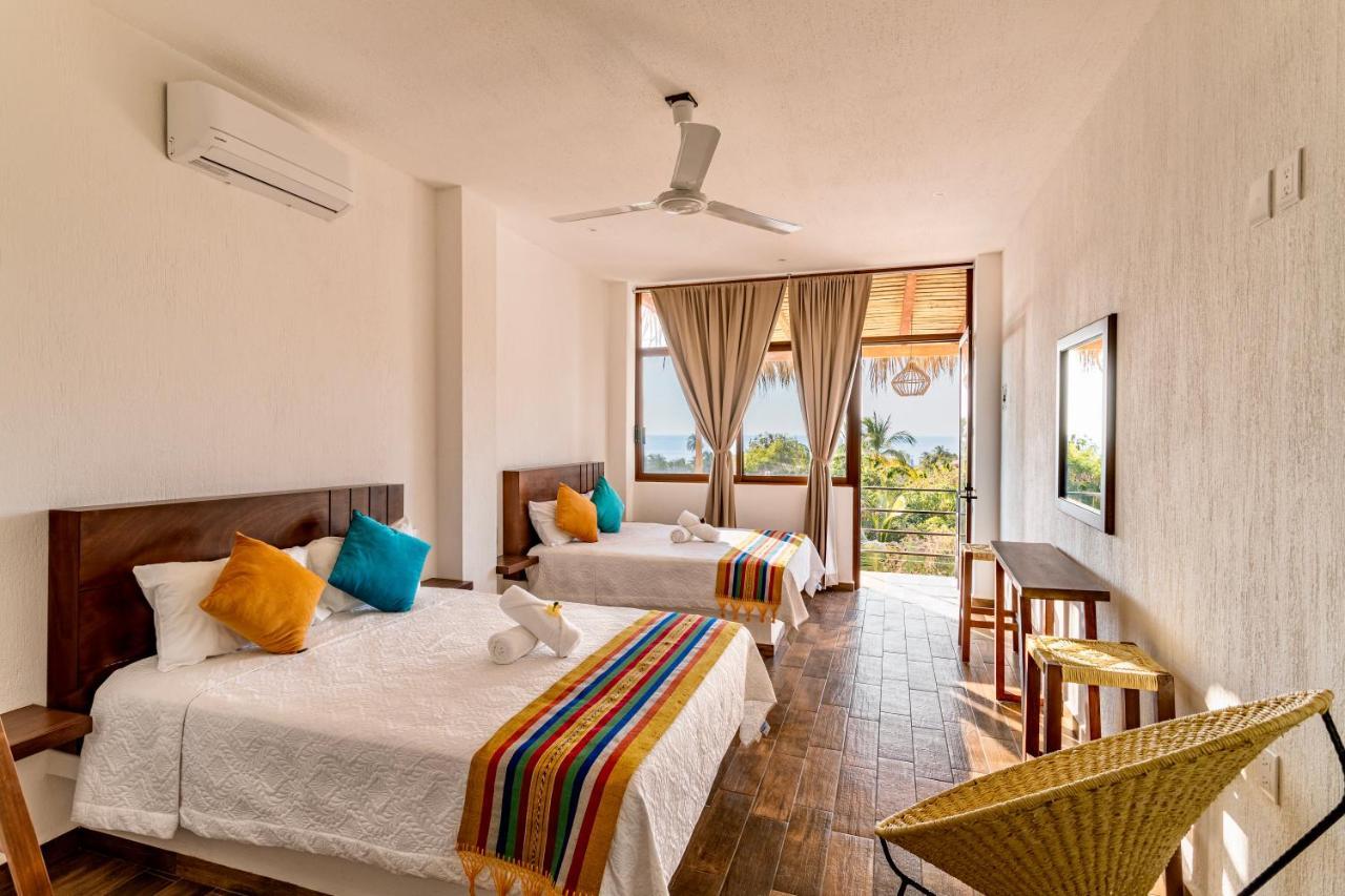 Punta Kai Hotel & Hostal 埃斯孔迪多港 外观 照片