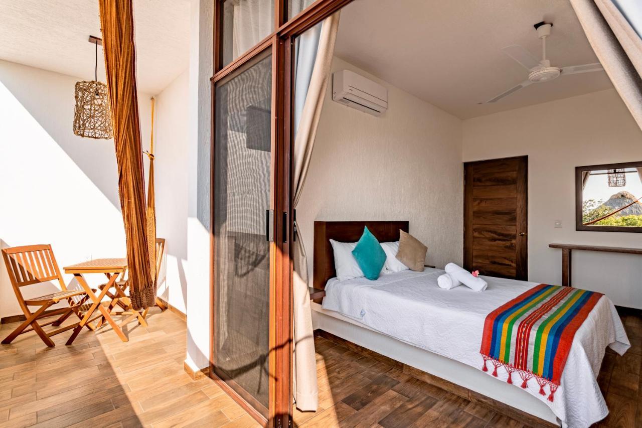 Punta Kai Hotel & Hostal 埃斯孔迪多港 外观 照片