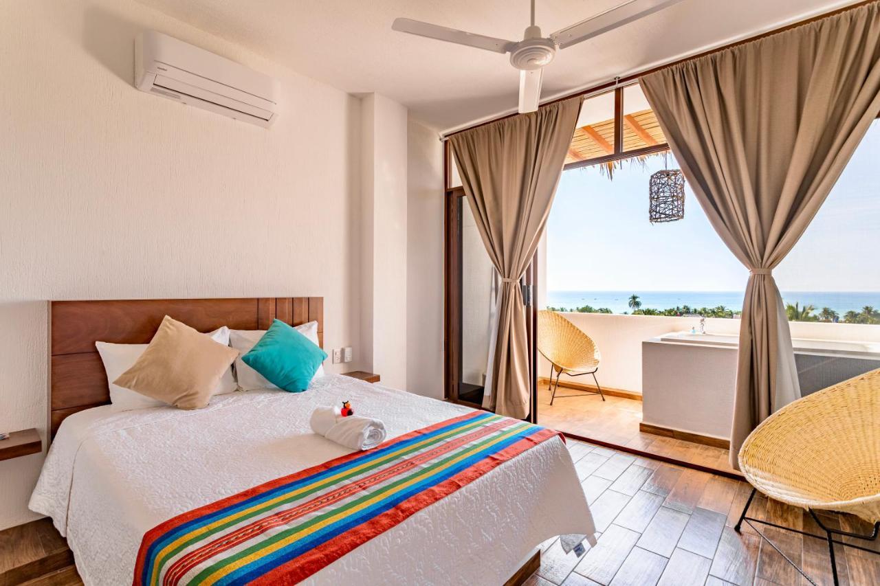 Punta Kai Hotel & Hostal 埃斯孔迪多港 外观 照片