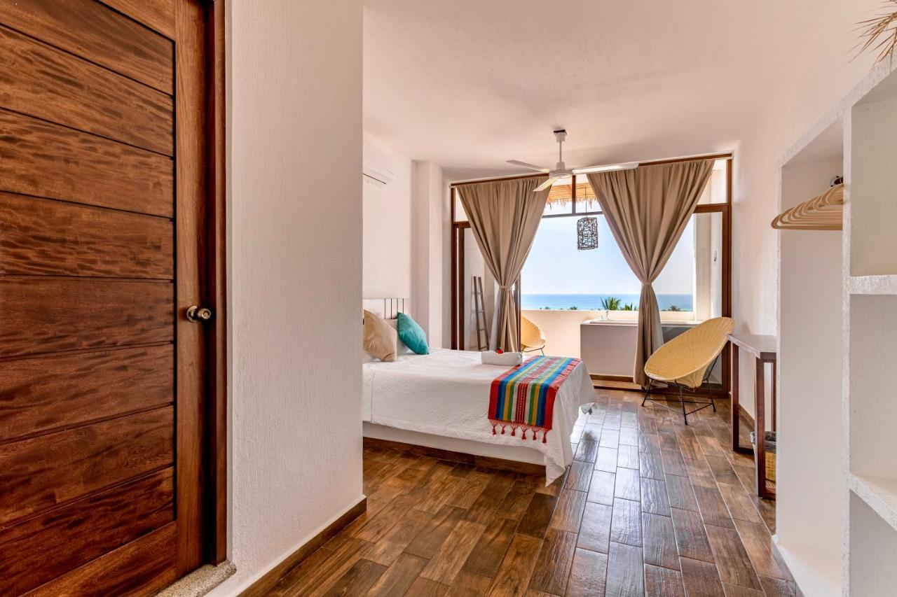 Punta Kai Hotel & Hostal 埃斯孔迪多港 外观 照片